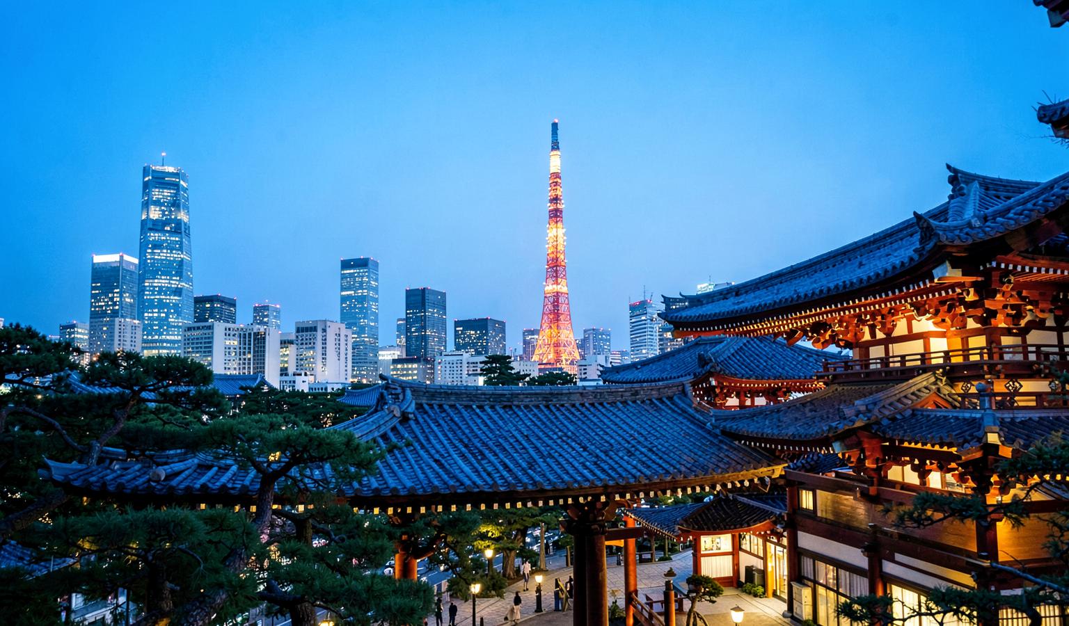 Tokyo skyline and temple at blue hour